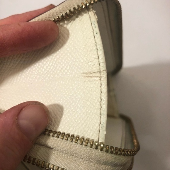 Coach debossed creamy white double zipper wristlet